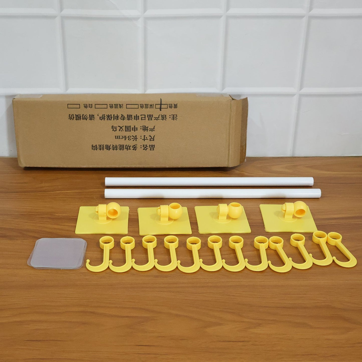 Detachable hook rod rack mounted on smooth wall for utility organization