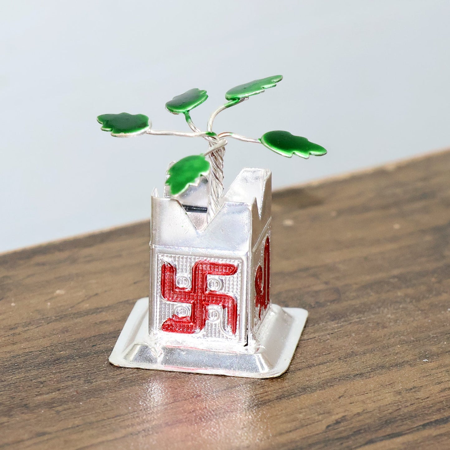 Tulsi Idol displayed on an office desk, adding a spiritual touch to the workspace.