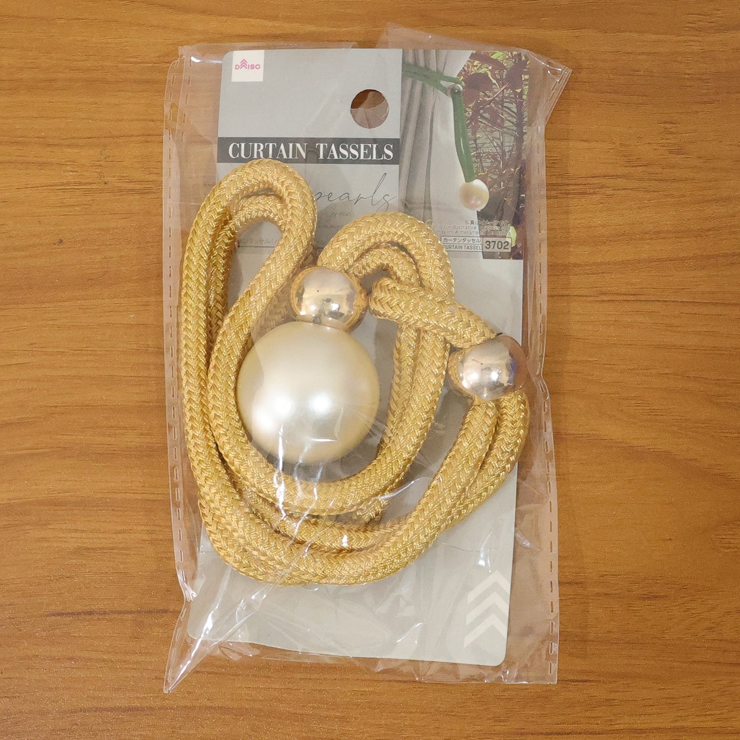 Decorative home curtain tie with braided rope and pearl embellishment