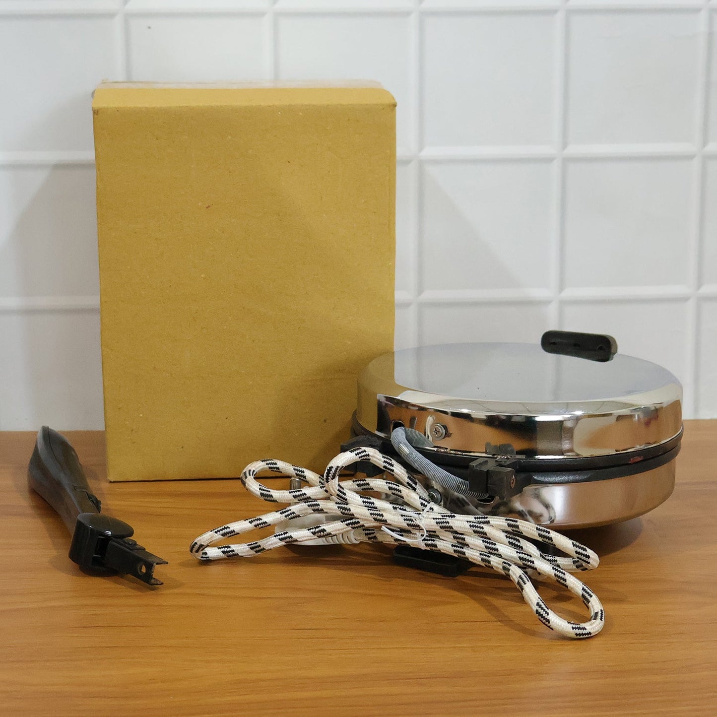 Comparison shot highlighting features of electric roti maker
