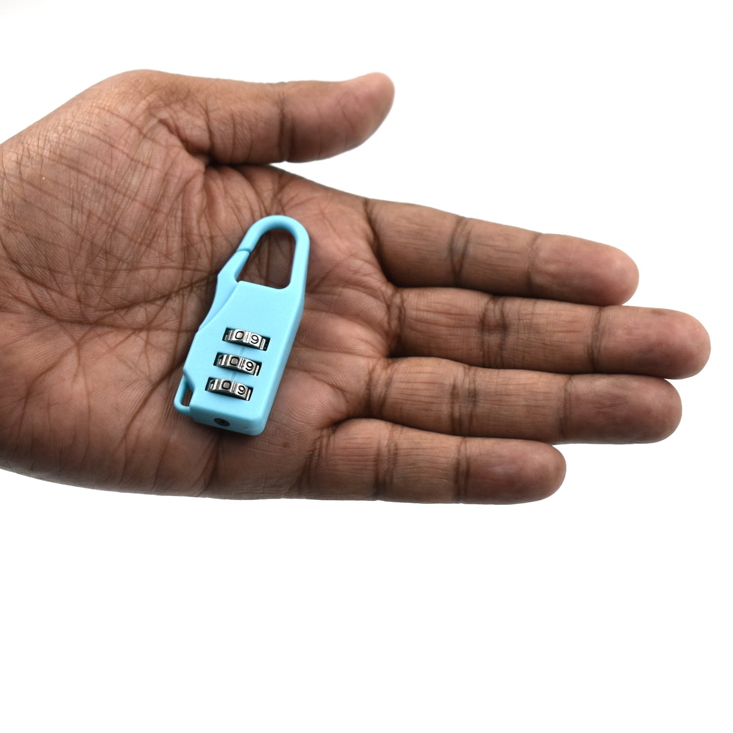 A light blue 3-digit combination lock resting in the palm of a hand on a white background.