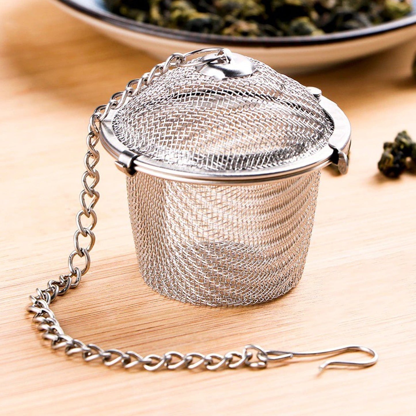Stainless steel mesh tea infuser featuring an easy-clean design for optimal and hygienic performance.