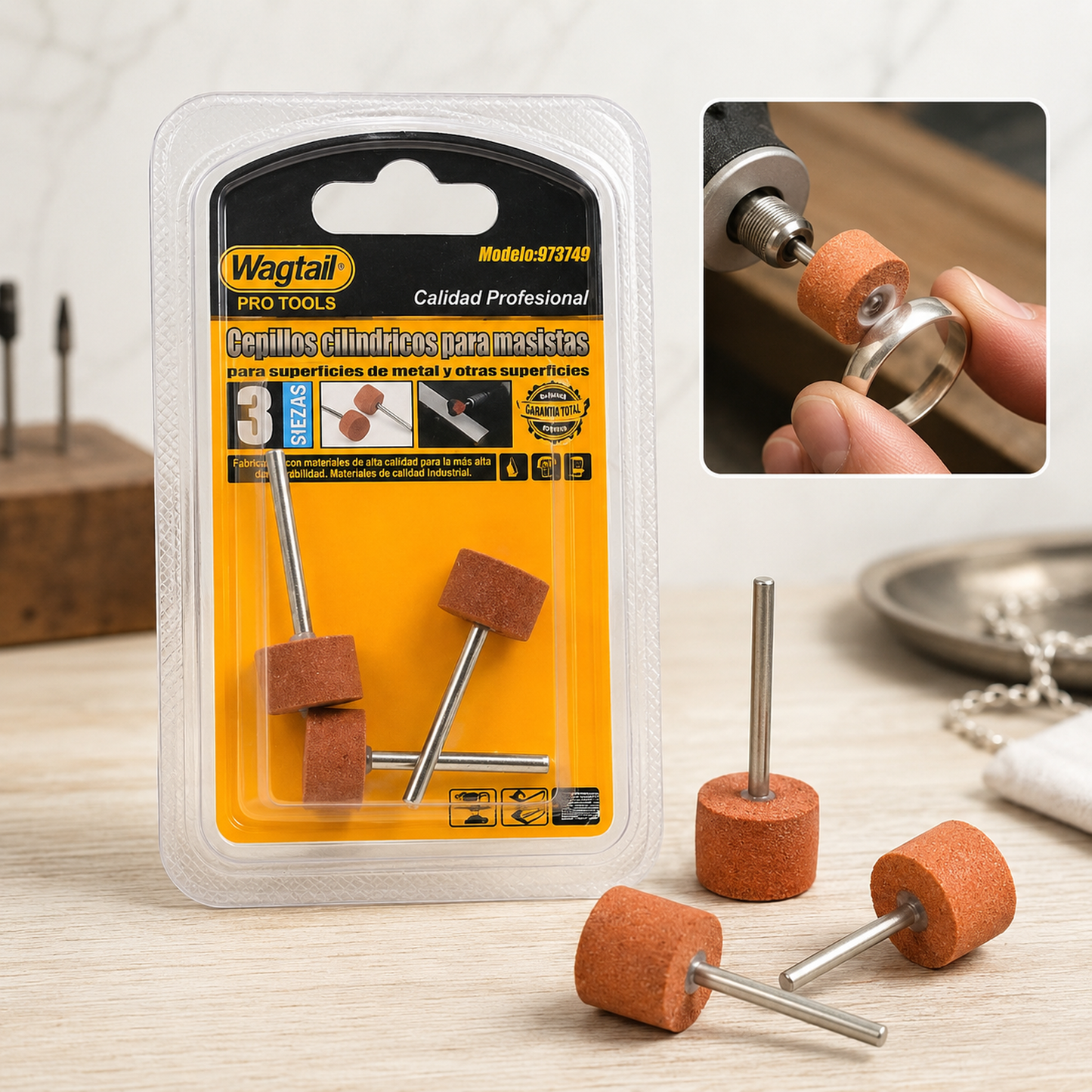 A 3-piece set of cylindrical abrasive grinding wheels in packaging, with two loose wheels and an inset of a wheel polishing