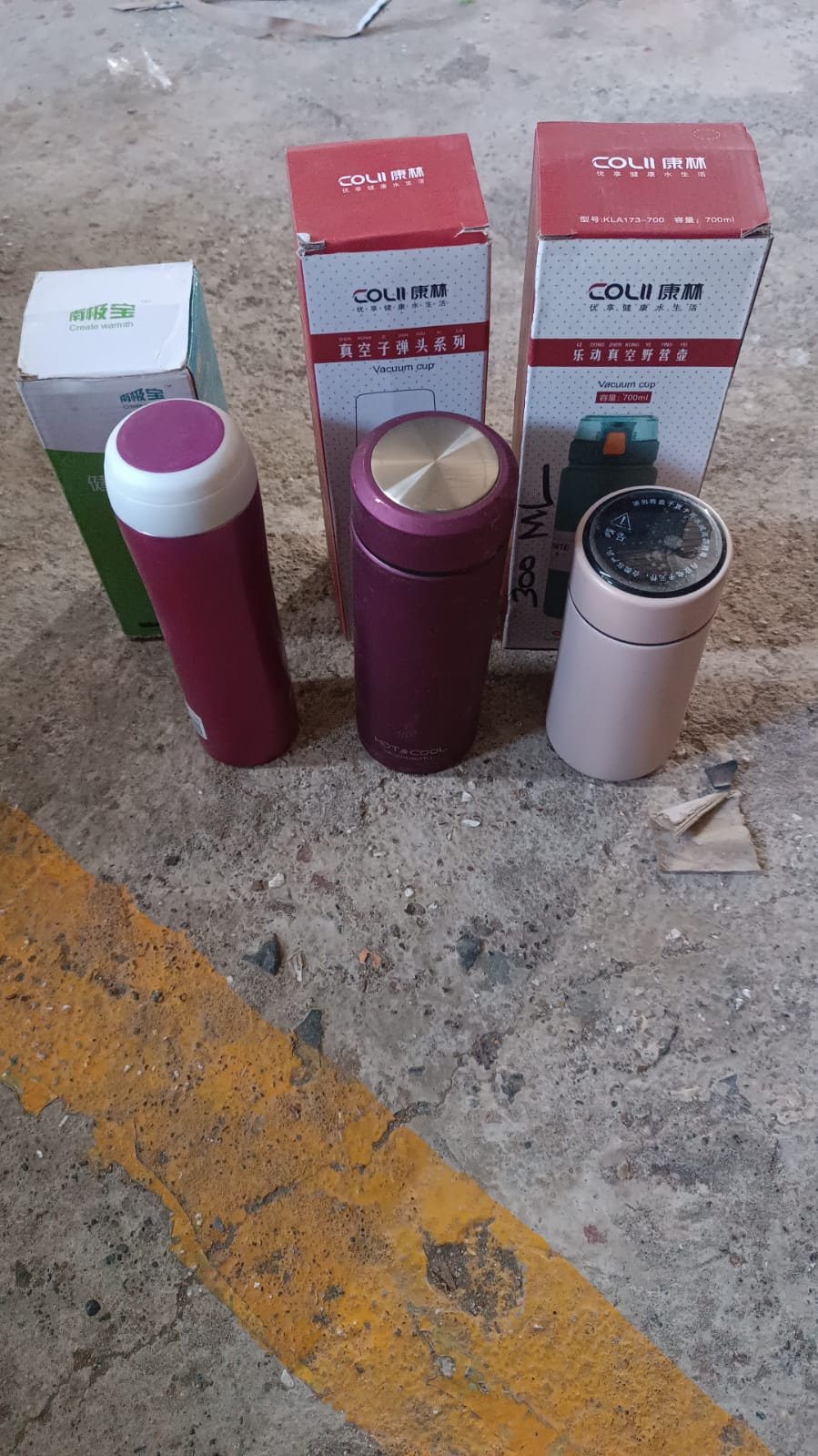 Group of assorted stainless steel insulated water bottles for travel