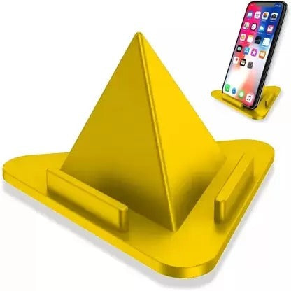 A yellow pyramid mobile stand with a phone displaying app icons in the background.