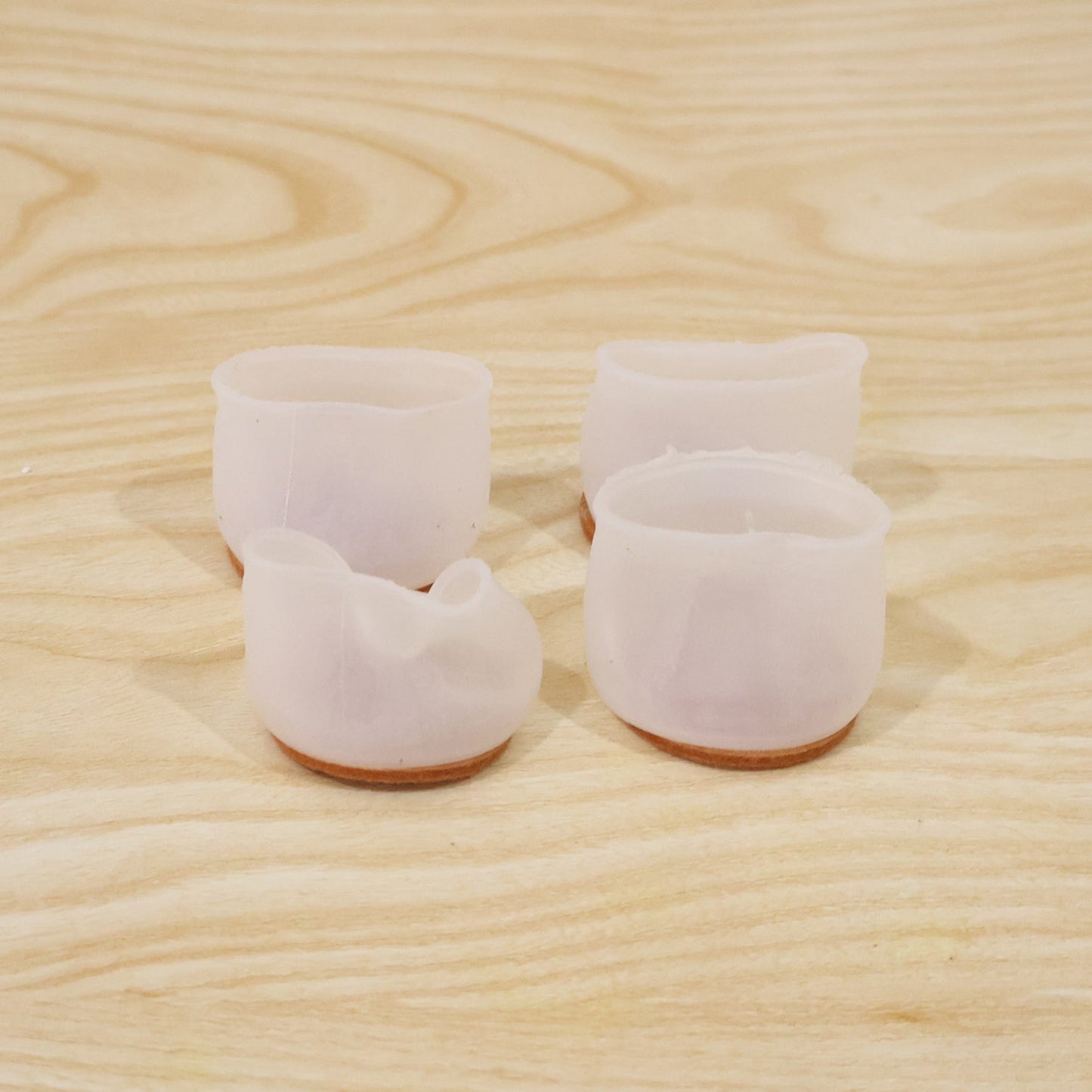 Silicone chair leg covers designed to protect floors and reduce noise
