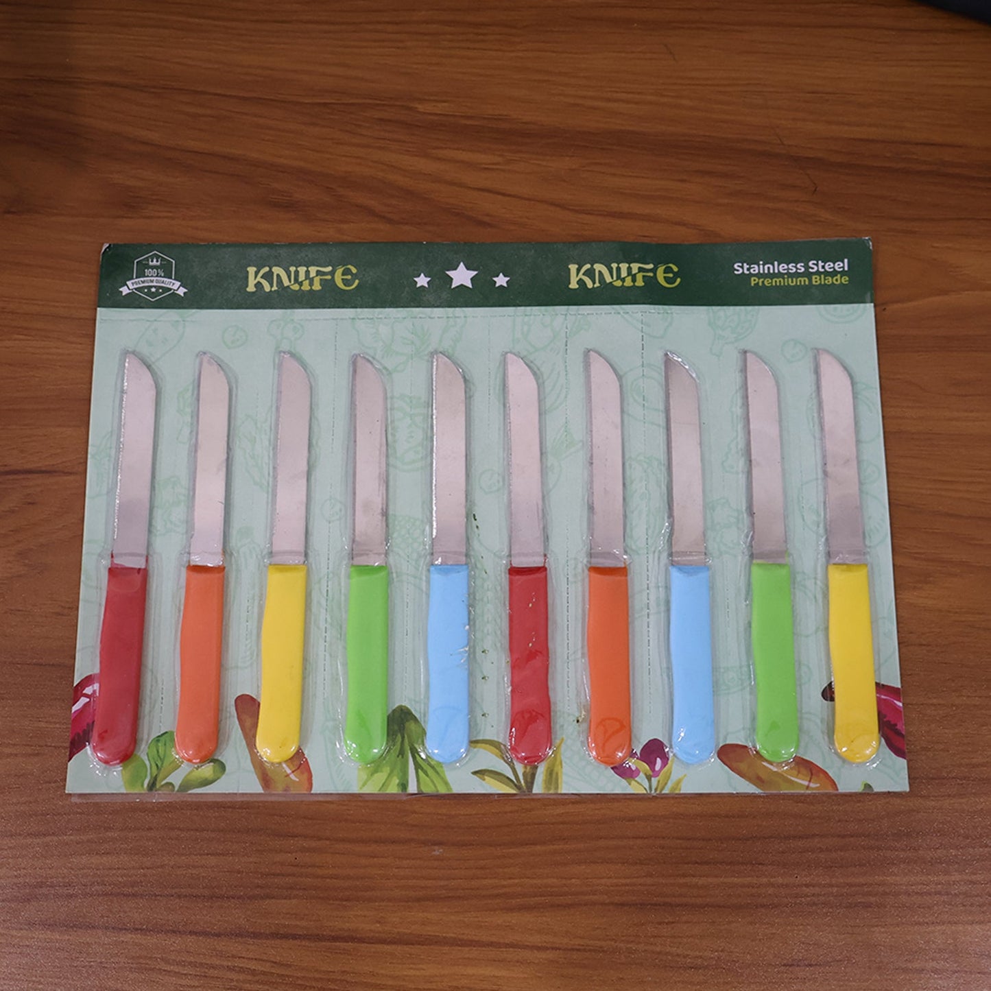Full view of stainless steel utility knives with plastic handles for daily kitchen tasks