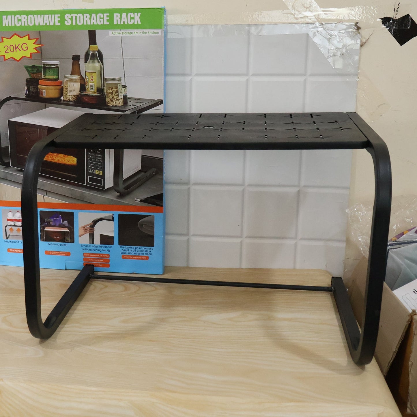 Live photo of metal microwave oven storage rack
