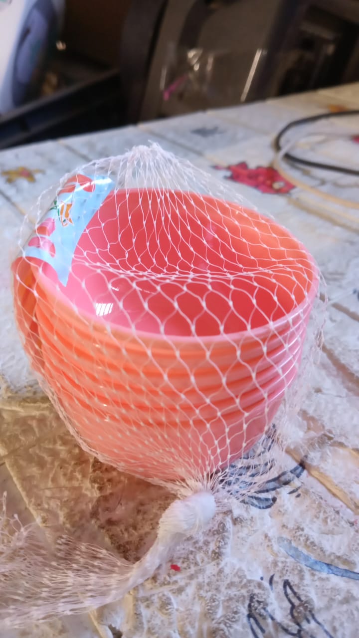 Arrangement of small durable plastic bowls, ready for daily use.
