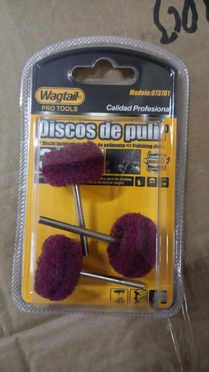 A 3-piece set of maroon buffing wheels in clear retail packaging on a cardboard surface.