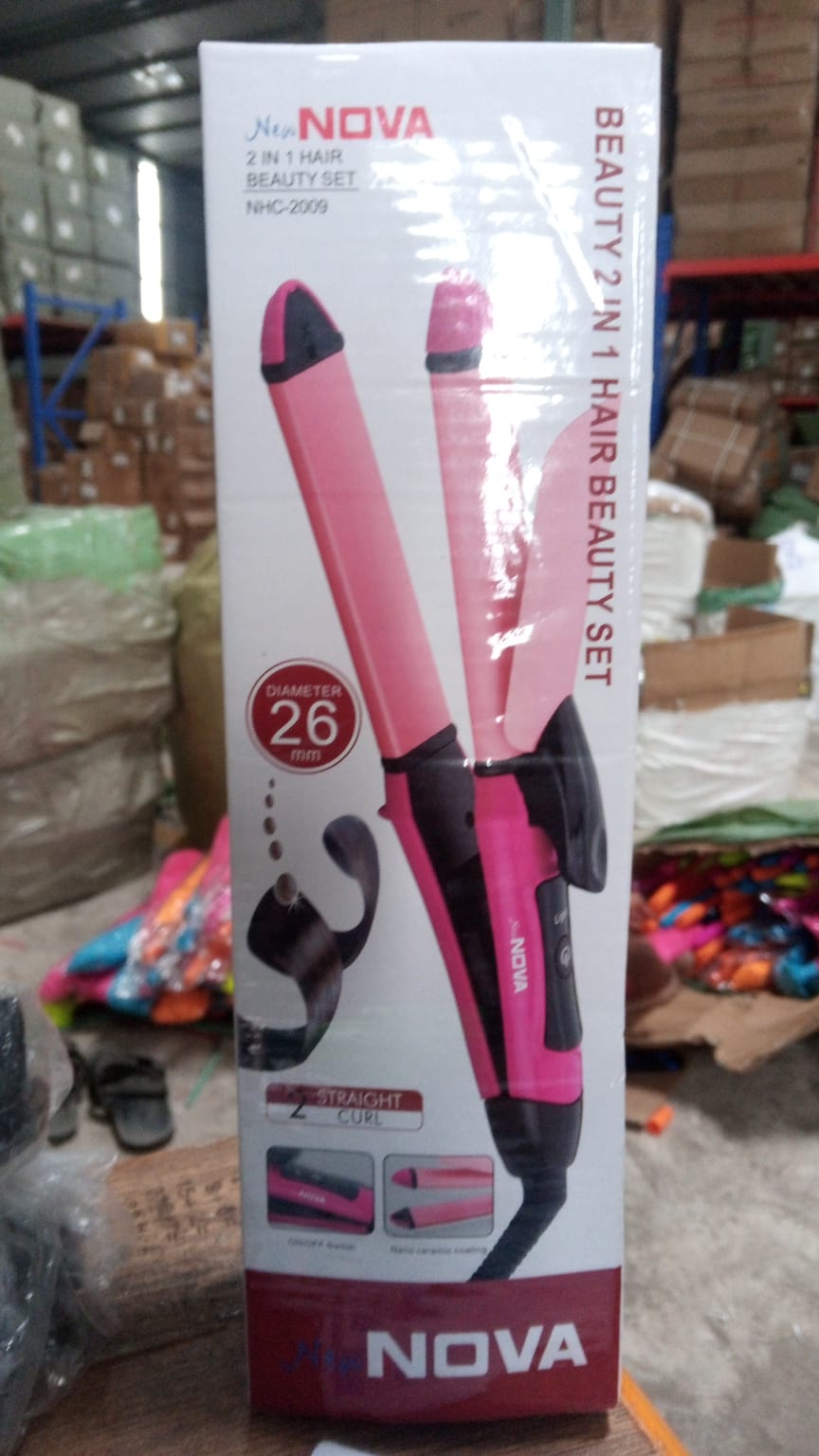 The product box for the Nova 2-in-1 Hair Beauty Set, featuring the pink hair tool and product details.