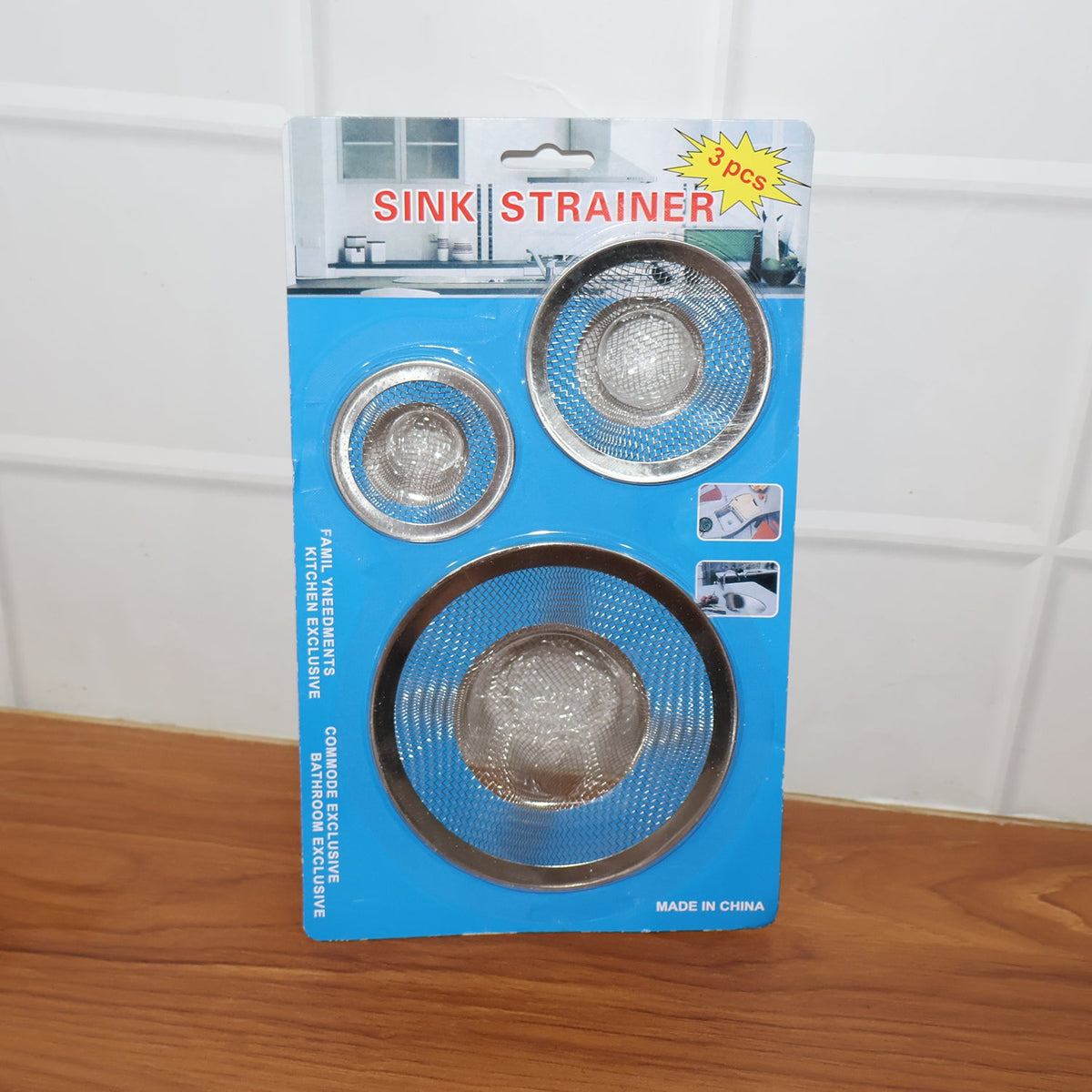 Three stainless steel mesh sink strainers displayed in blue and white retail packaging.