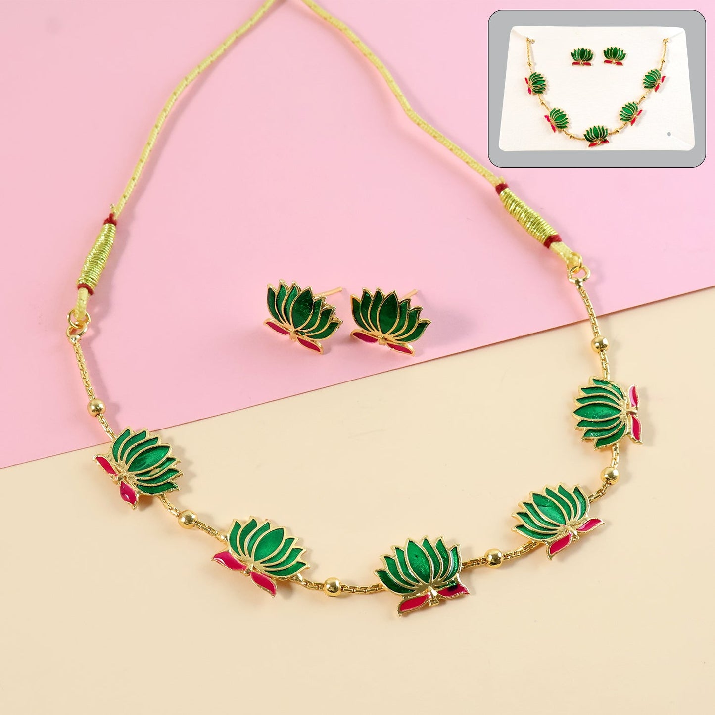 Lotus motif green and gold-tone necklace set with matching stud earrings