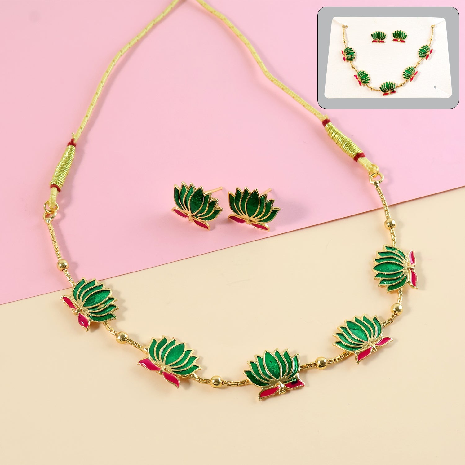 Lotus motif green and gold-tone necklace set with matching stud earrings