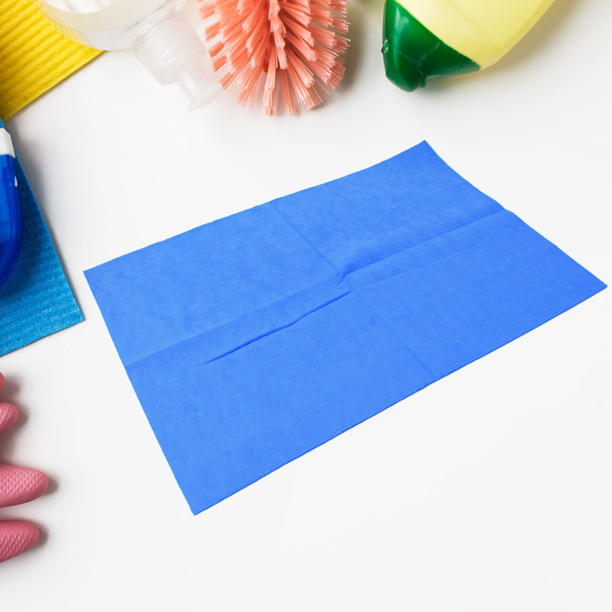 Folded Magic Cleaning Towel on a clean white surface, ready for use.