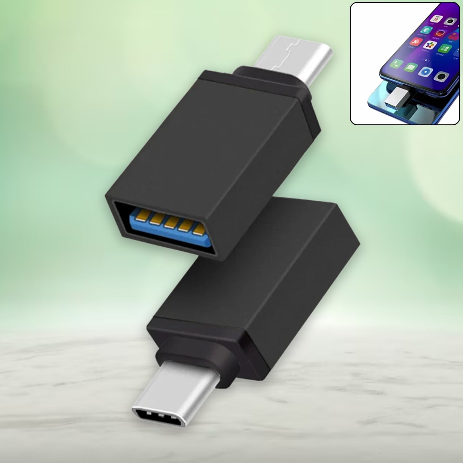 Two black USB-C to USB 3.0 OTG adapters are angled against a green and white background, with a phone in an inset.