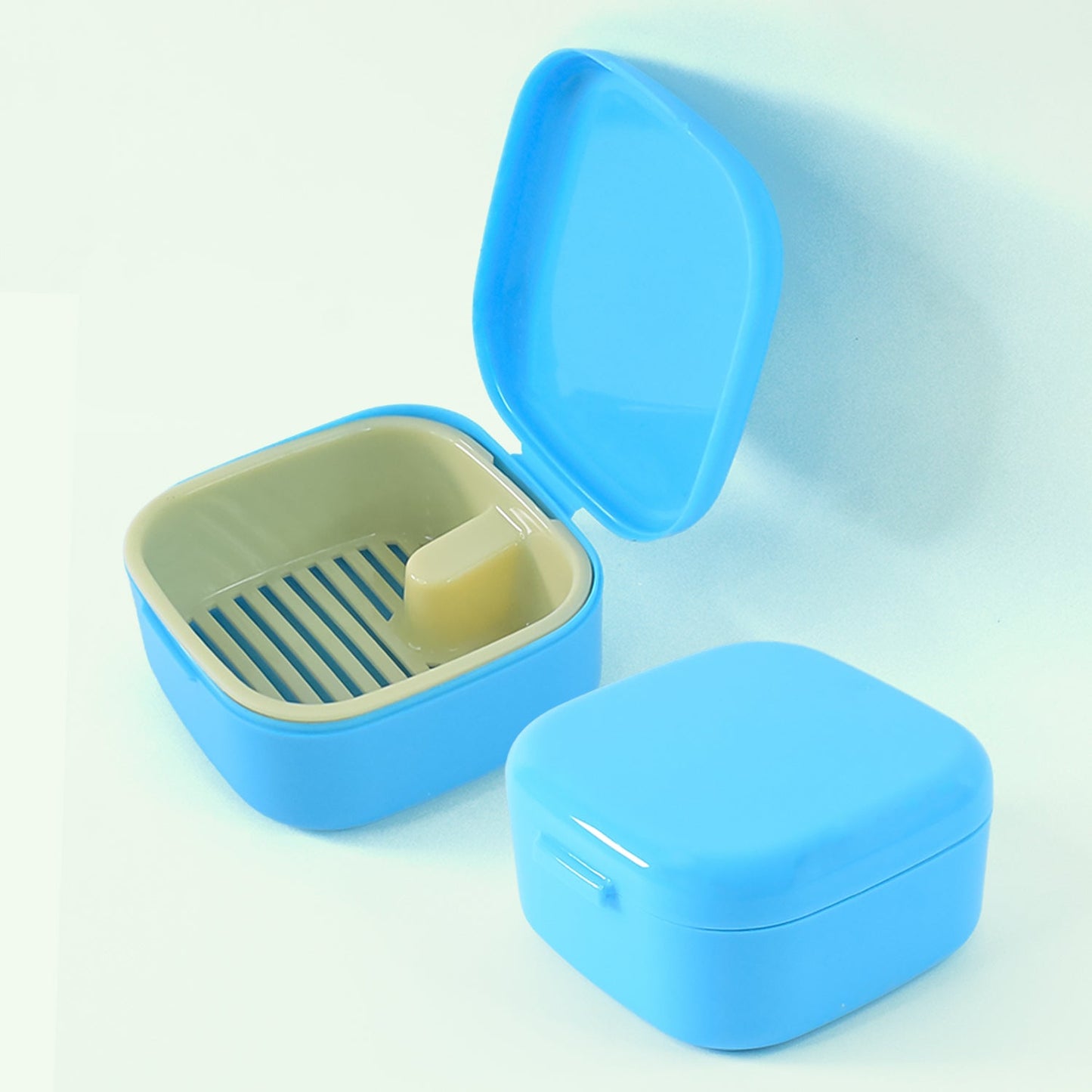 Clear multi-purpose storage box with lid and drain tray to keep items dry