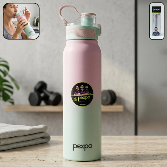 A pink and green gradient water bottle with a woman drinking from it in an inset. The bottle is on a counter with weights 
