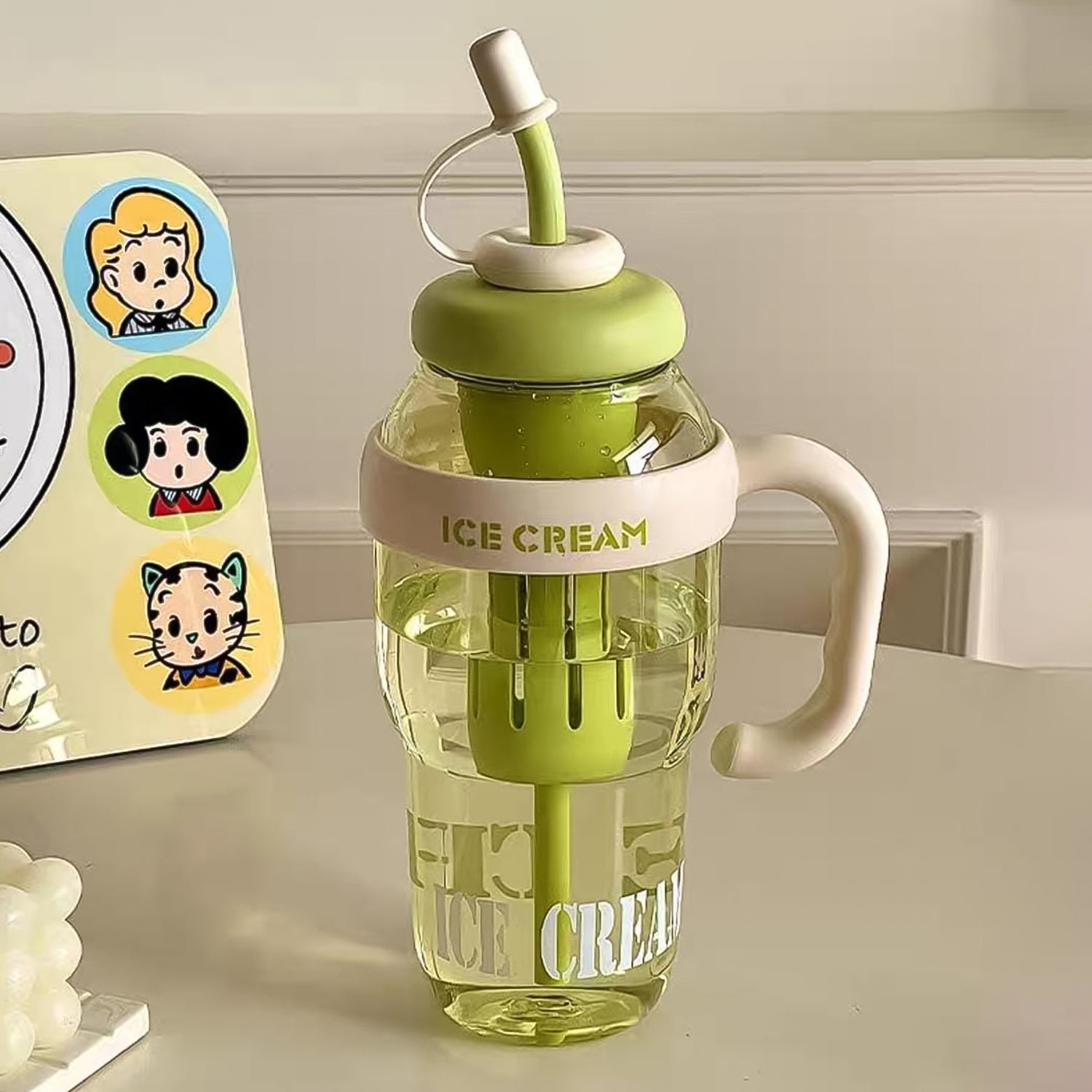 Cute ice cream themed water bottle with integrated straw and handle