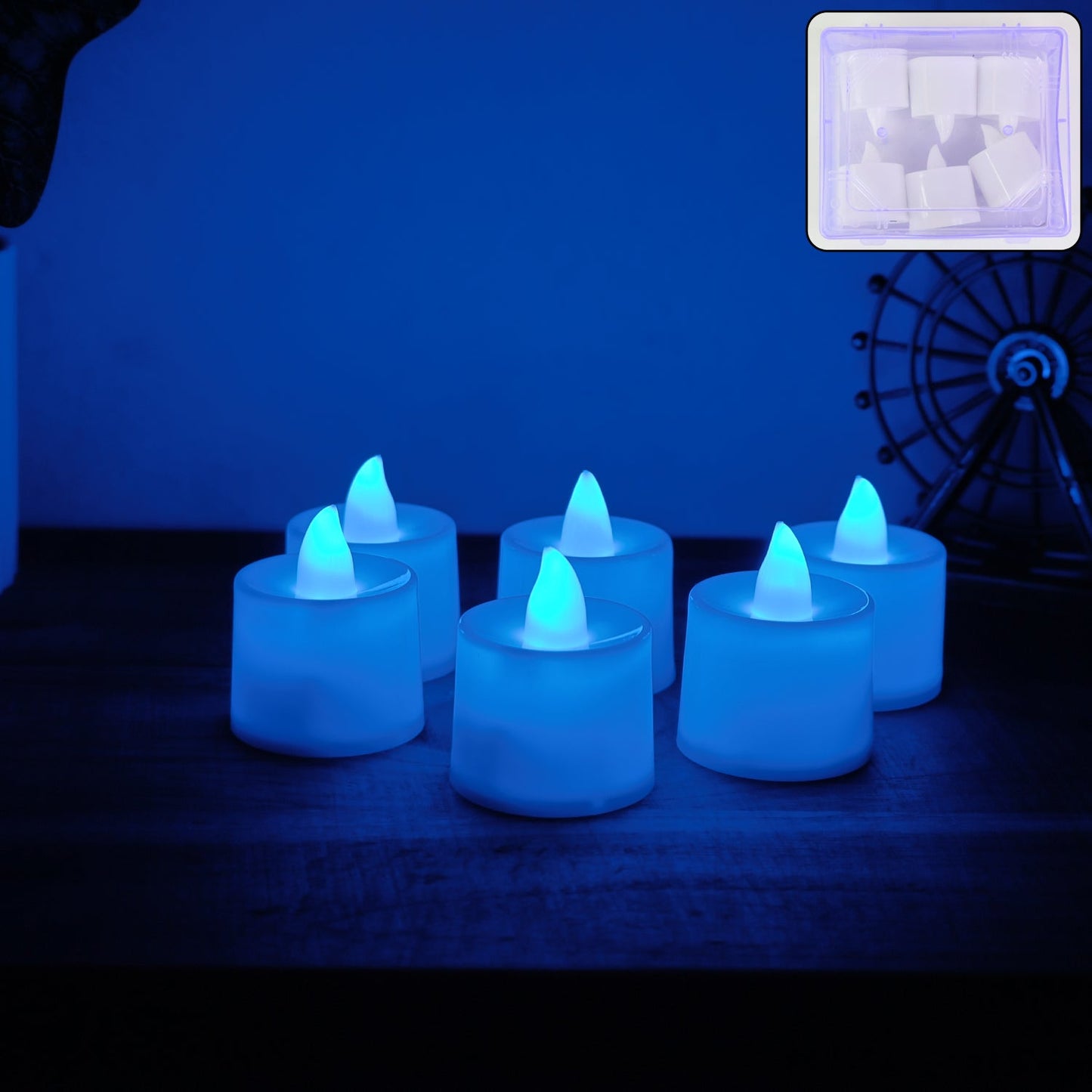 Blue LED Tea Light Candle glowing brightly in dark setting