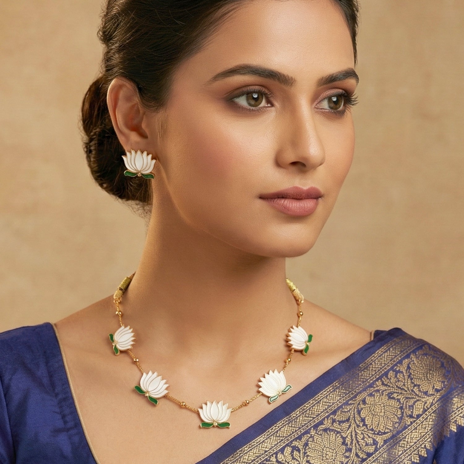 Traditional jewellery set featuring white lotus design necklace and stud earrings