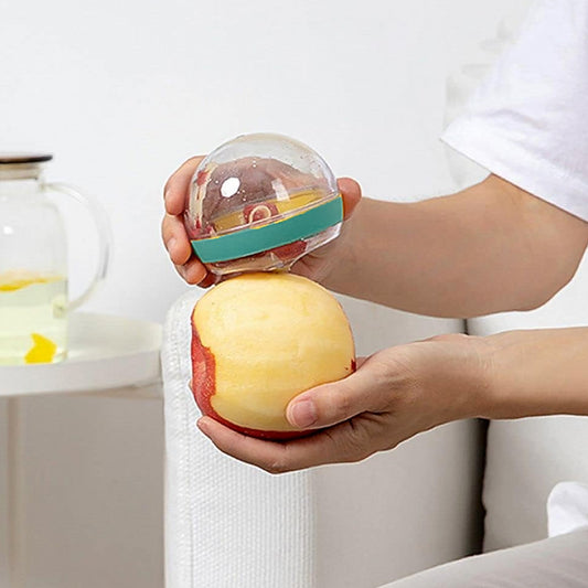 Quickslice multifunctional round peeler with peel-catching container.
