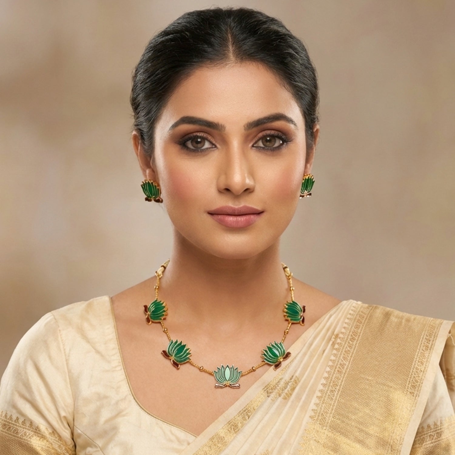 Jewellery set showing lotus motif necklace with matching studs