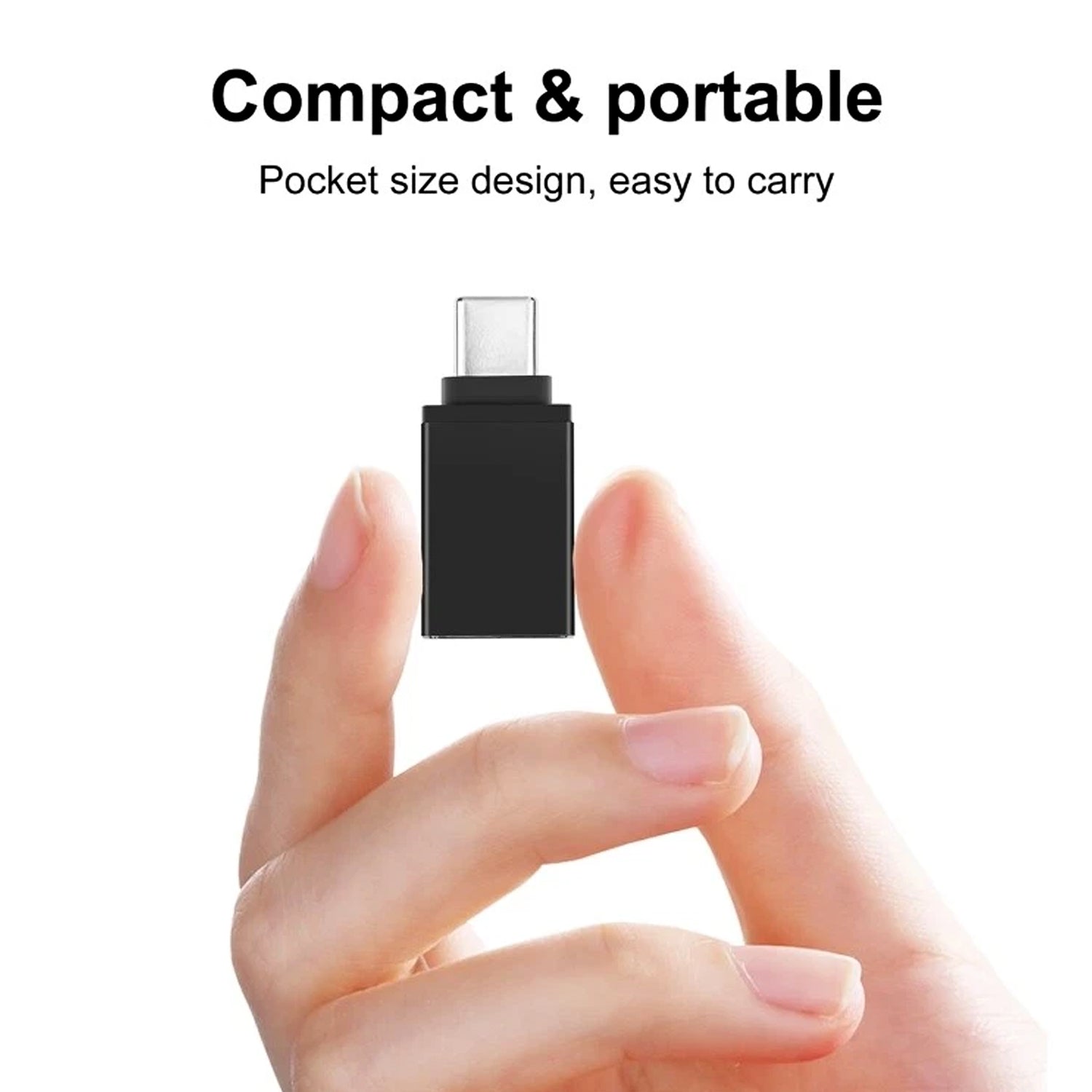 A hand holds a small black USB-C to USB 3.0 OTG adapter on a white background, emphasizing its compact size.