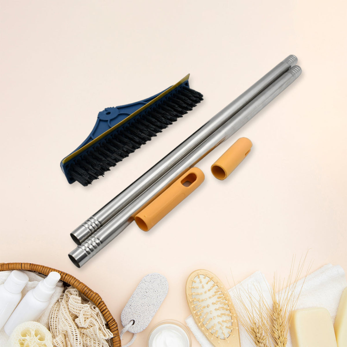 Disassembled blue and yellow floor cleaning brush with silver handle sections, arranged on a light background with bath