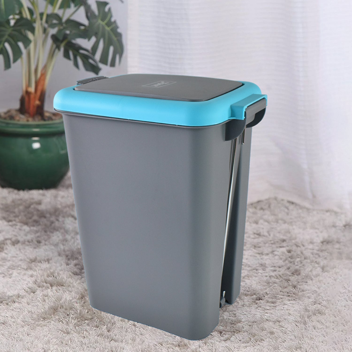 Close-up of Push N Pedal Dust Bin foot pedal mechanism for hands-free trash opening