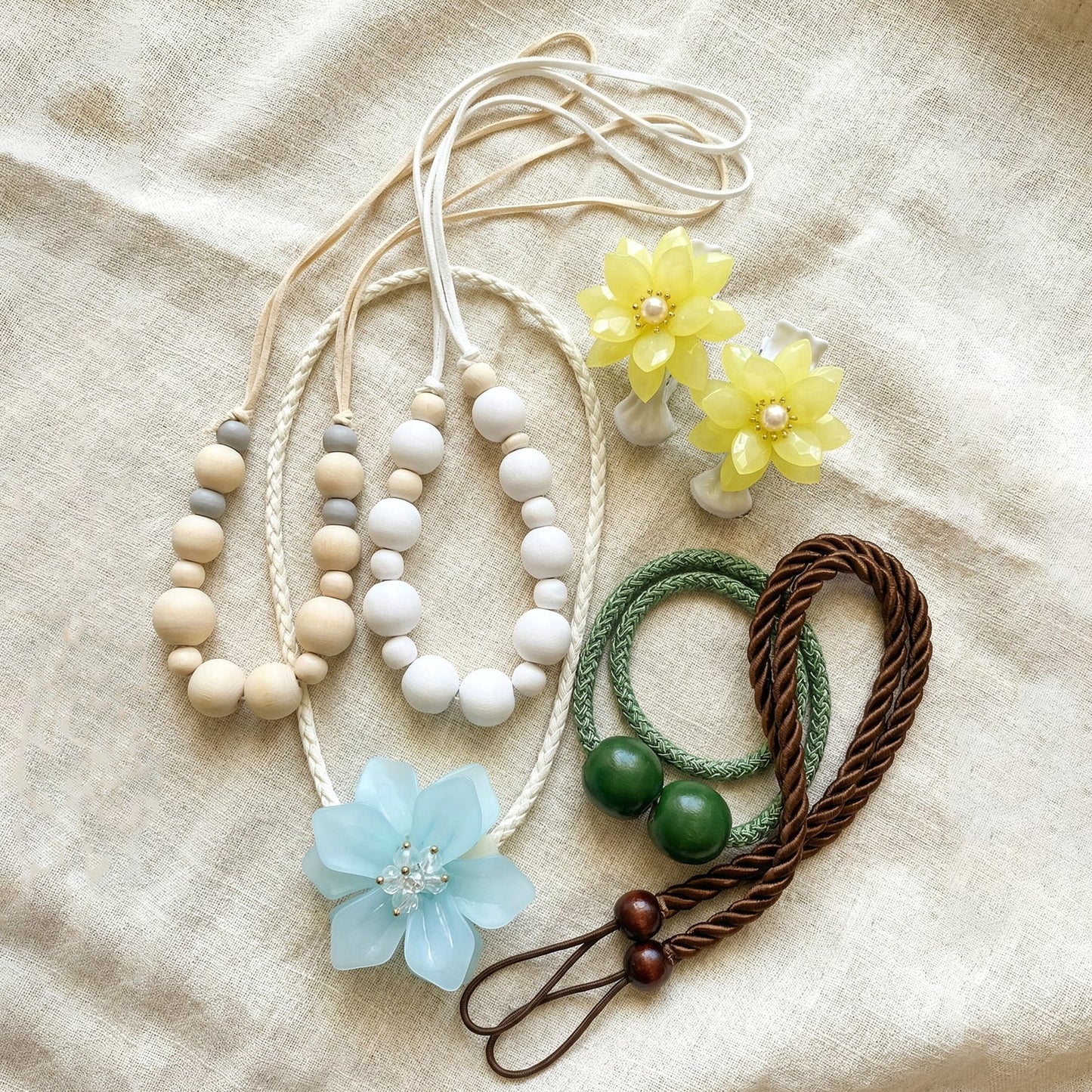 Elegant curtain holdback featuring beaded rope and floral accents