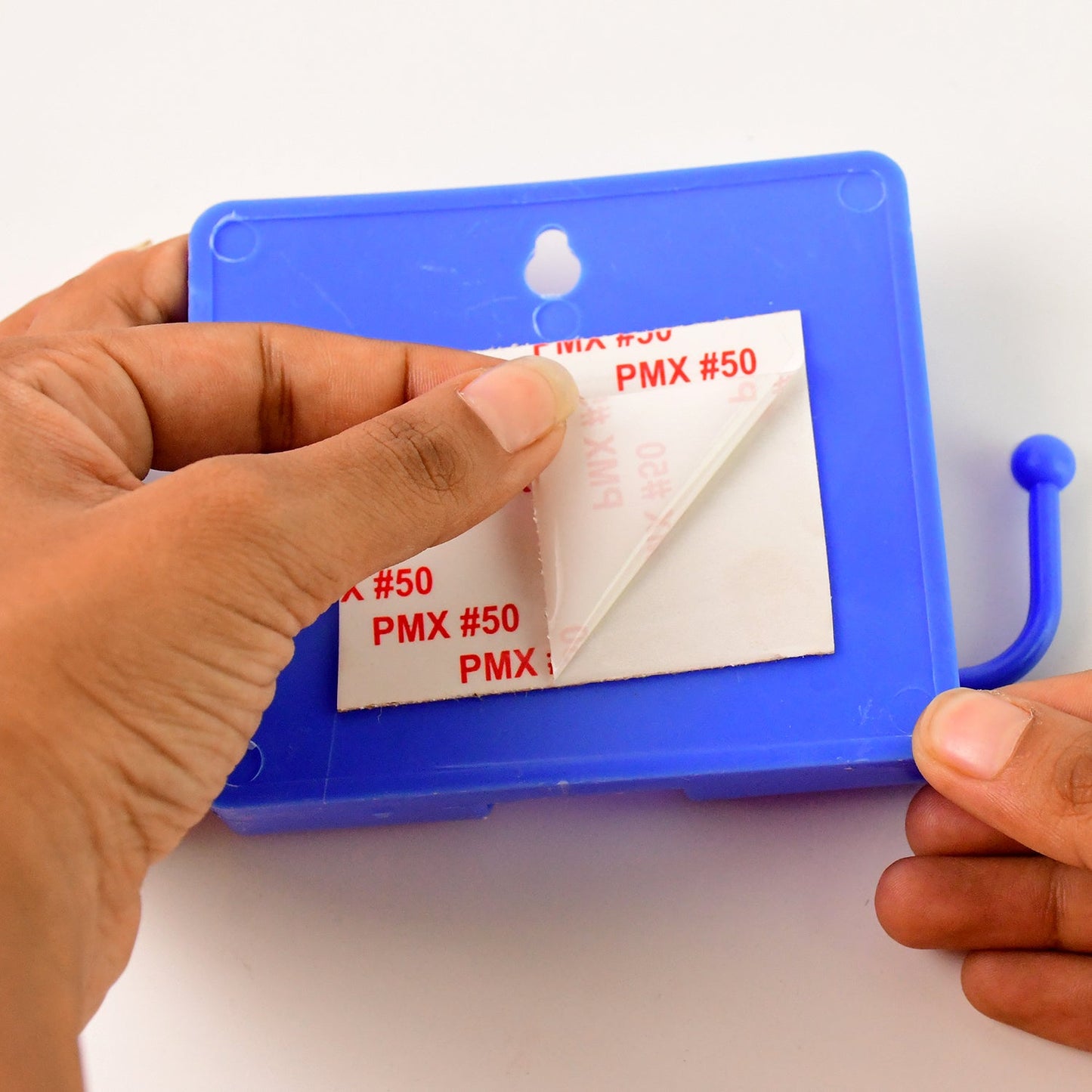 Compact blue wall mobile stand with hook for hanging items