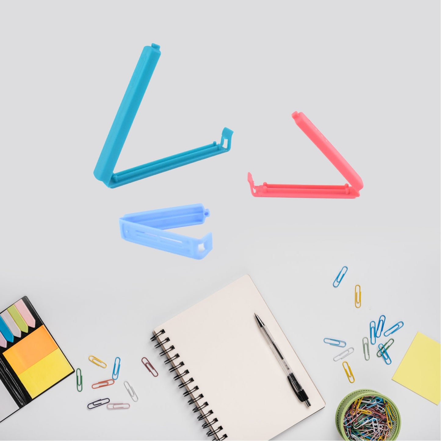 Assorted sizes of Ritu reusable plastic sealing clips for various pouches.