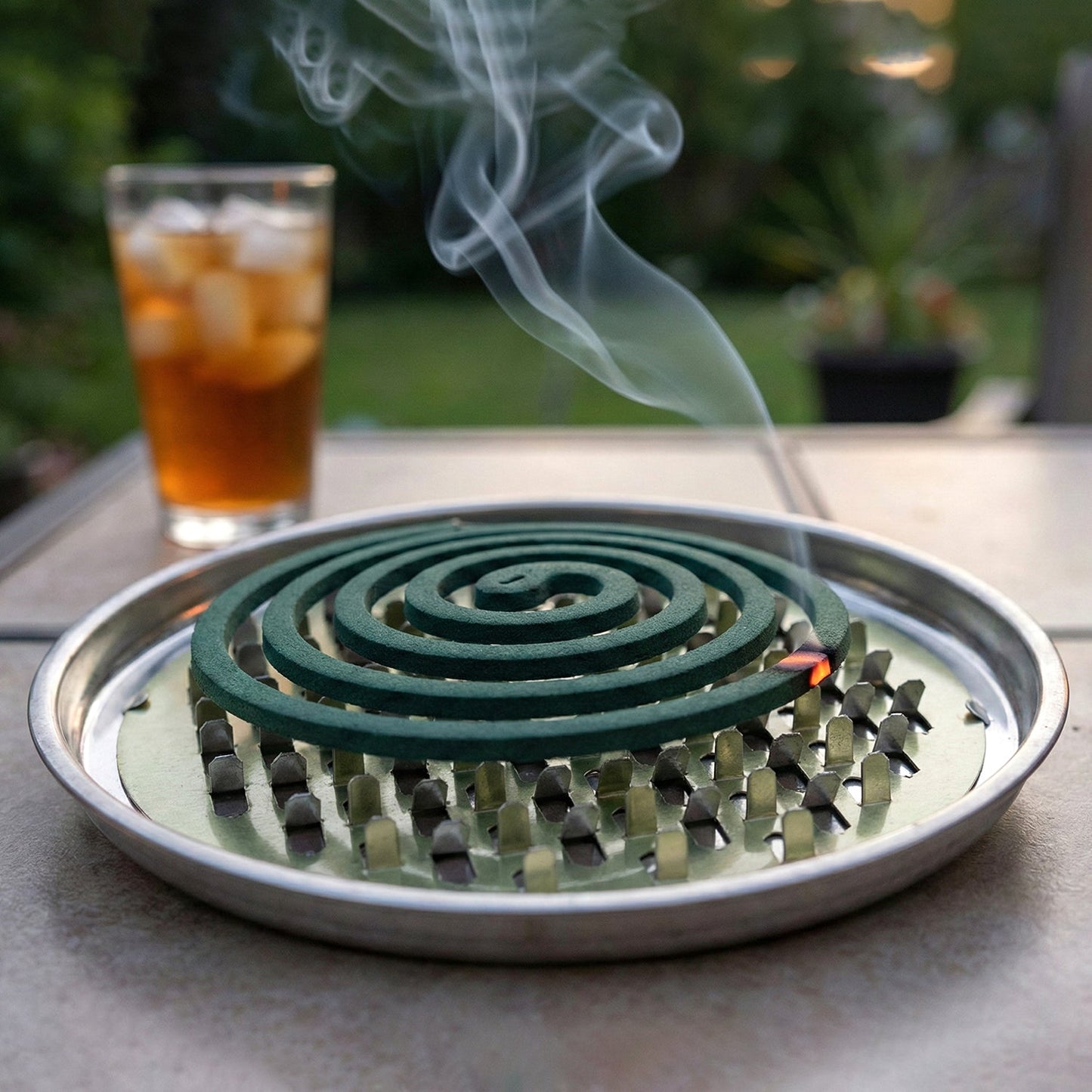 Compact round mosquito coil stand for indoor outdoor use