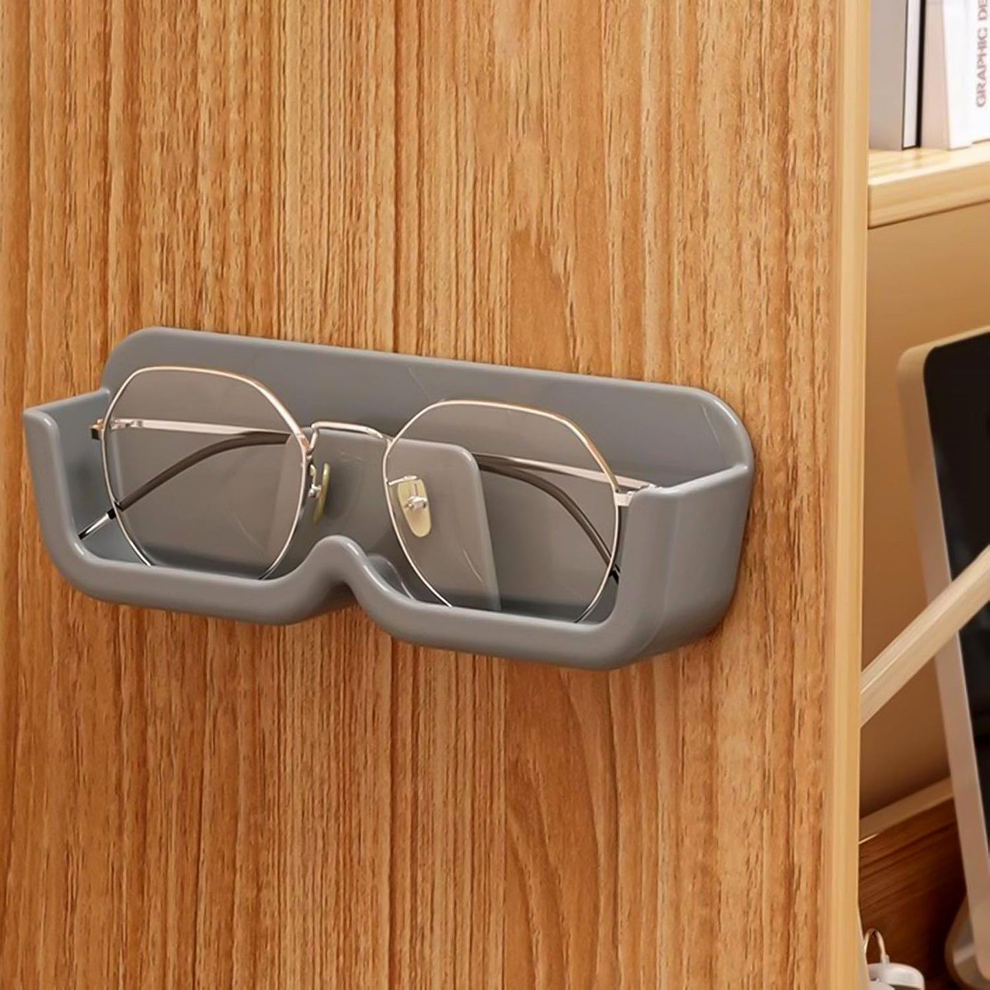 Compact eyewear organizer mounted on wall holding sunglasses