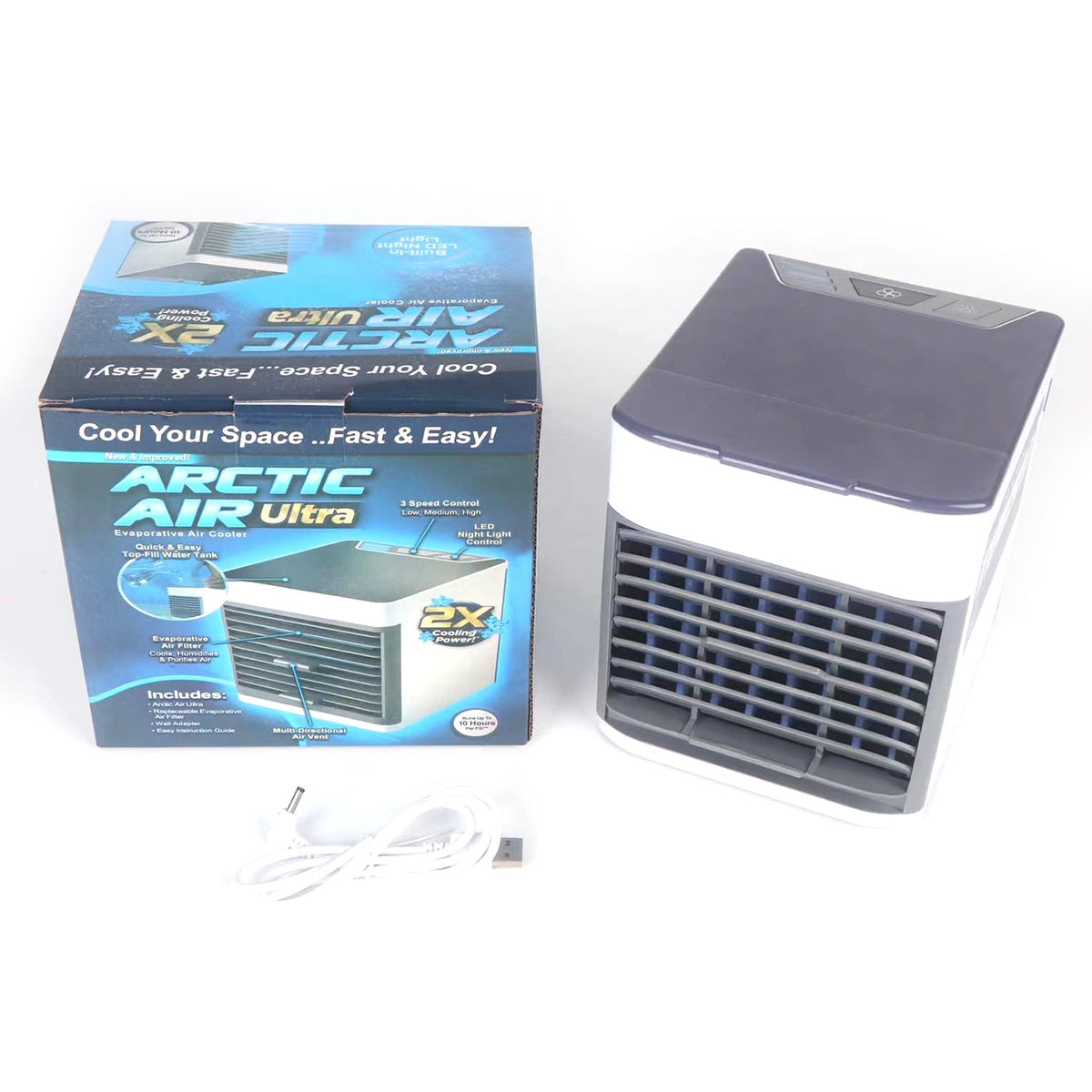 A white and gray portable air cooler with a blue top, next to its blue and white product box on a white surface.