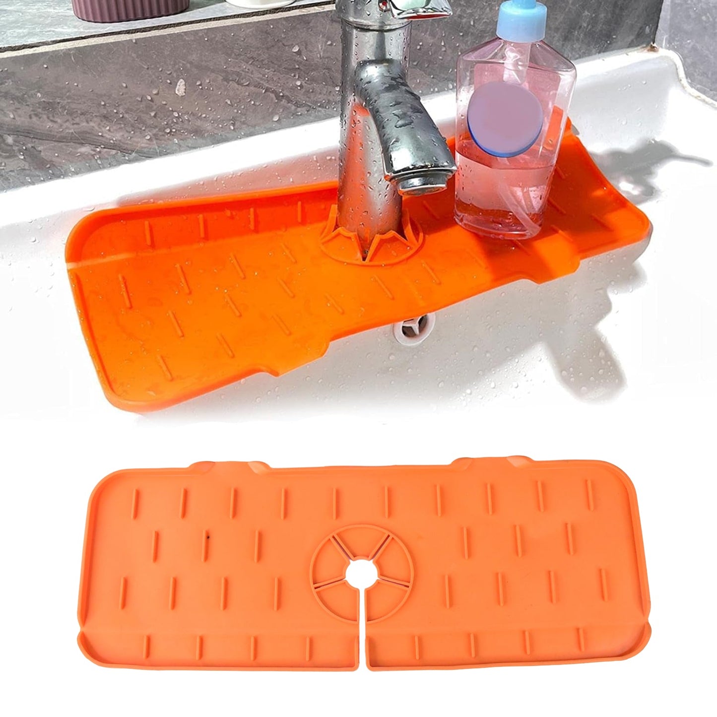 Orange silicone faucet splash guard with a soap dispenser on a white sink, with a separate mat below.