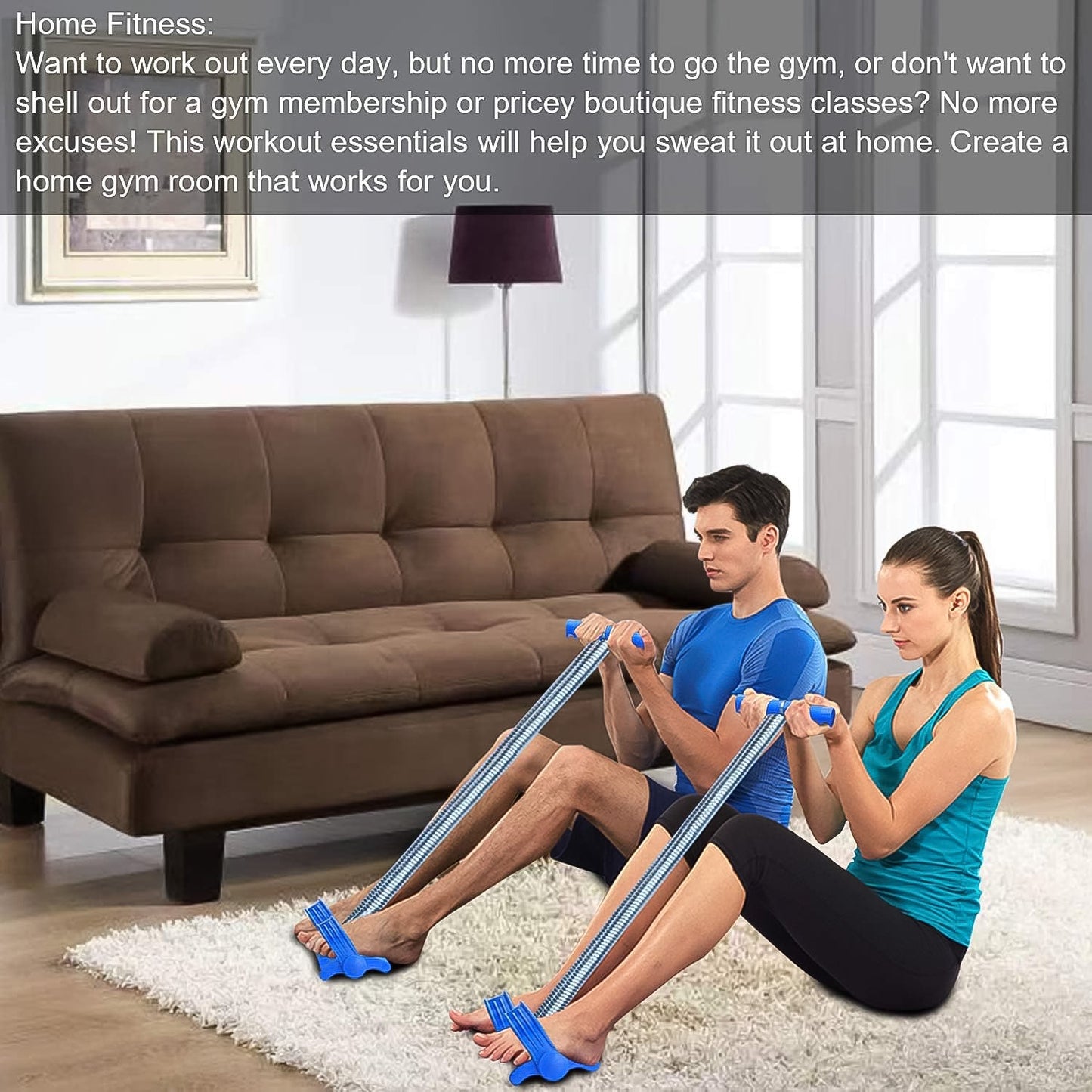 A man and woman sit on a white rug in a living room, using blue foot pedal exercisers with a brown sofa behind them.