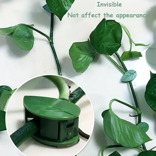 Leaf-shaped green plant climbing clips neatly arranged on a white background.