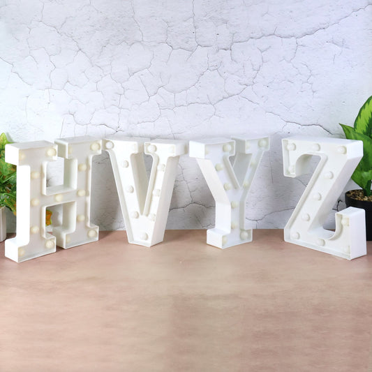 Battery operated LED decorative night light glowing on table in kids room