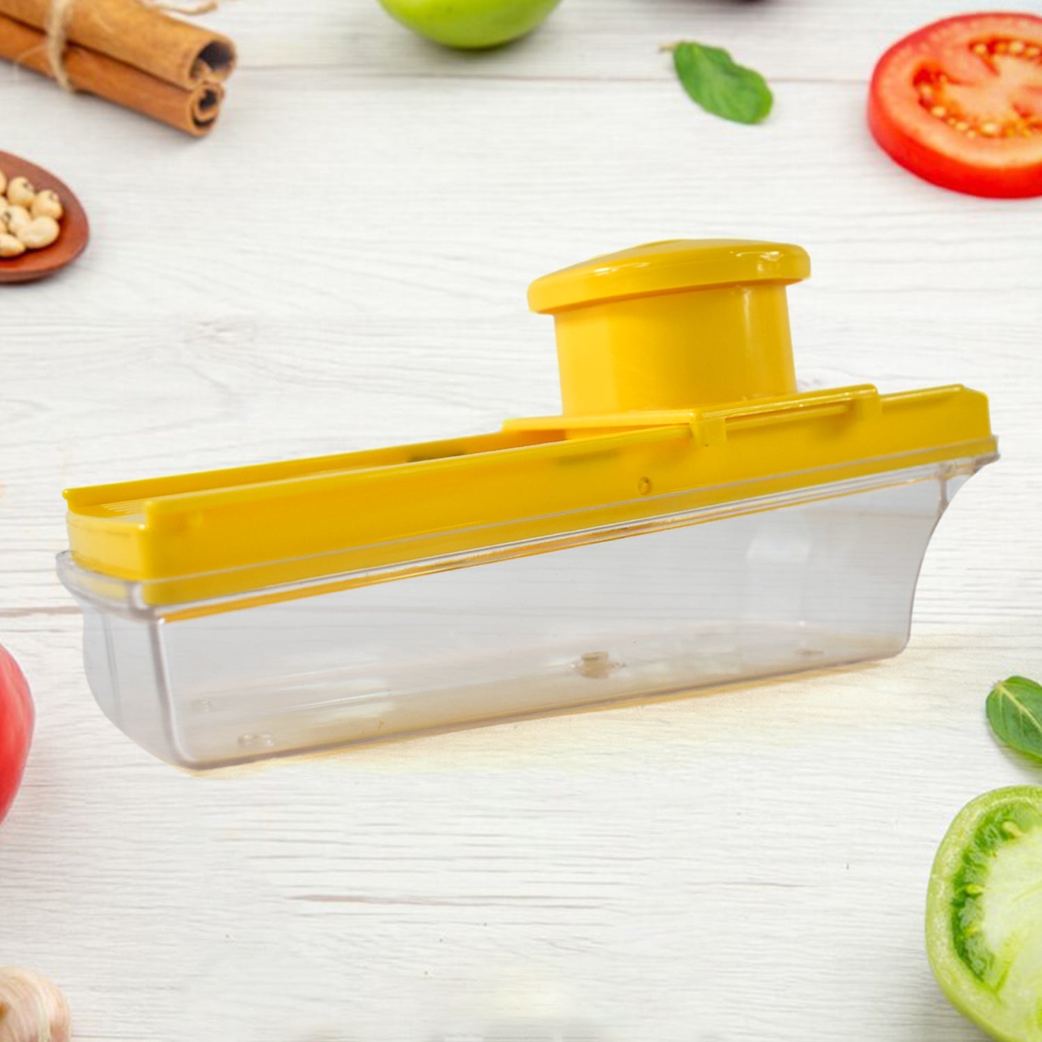 Manual vegetable and fruit slicer angled view showing sharp blade