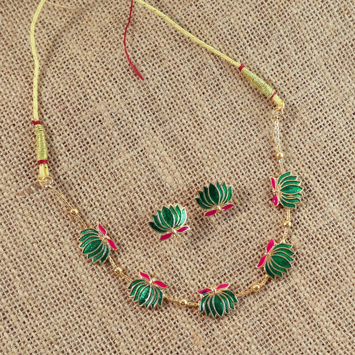 Traditional green enamel lotus motif necklace with gold-tone beads
