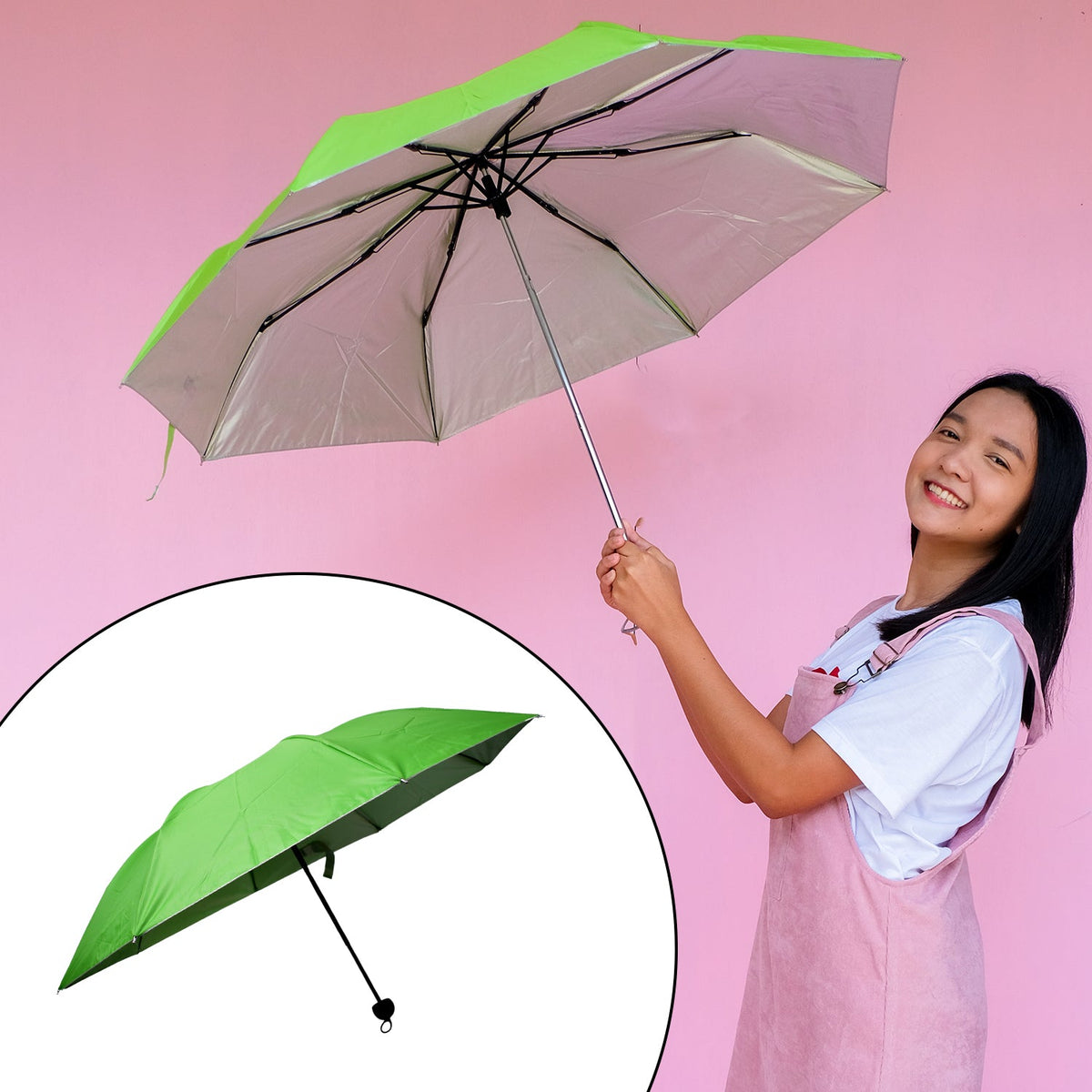 A smiling woman holds an open green and silver umbrella against a pink wall, with a smaller closed umbrella inset.