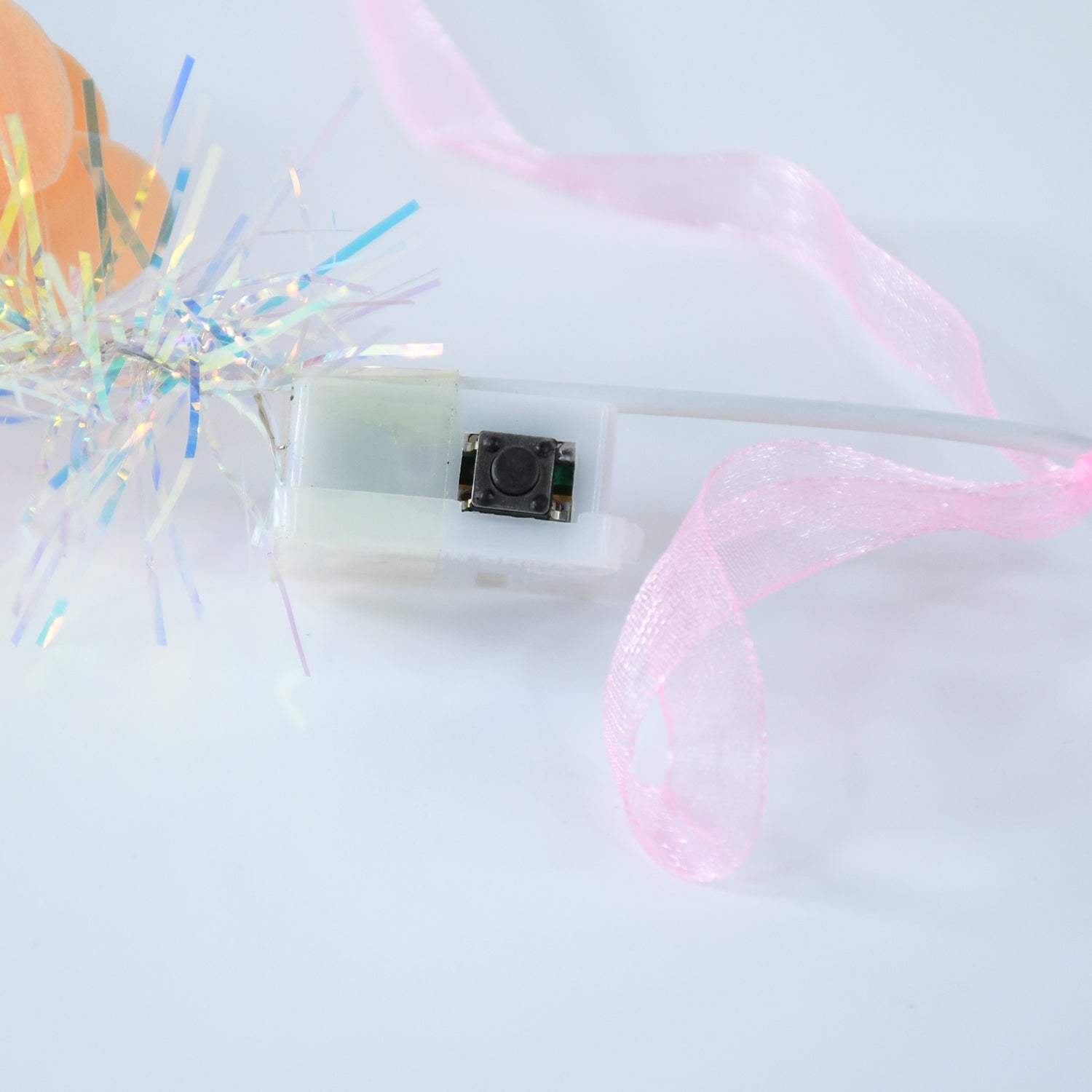 Lumi Bloom Floral Headband lit up with vibrant multicolor LED roses