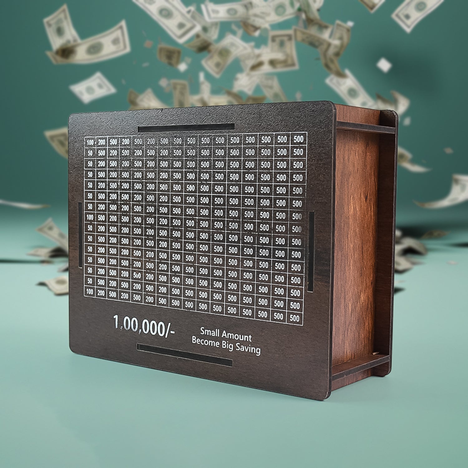 A dark brown wooden savings box with a white grid tracker, surrounded by falling dollar bills against a teal background.