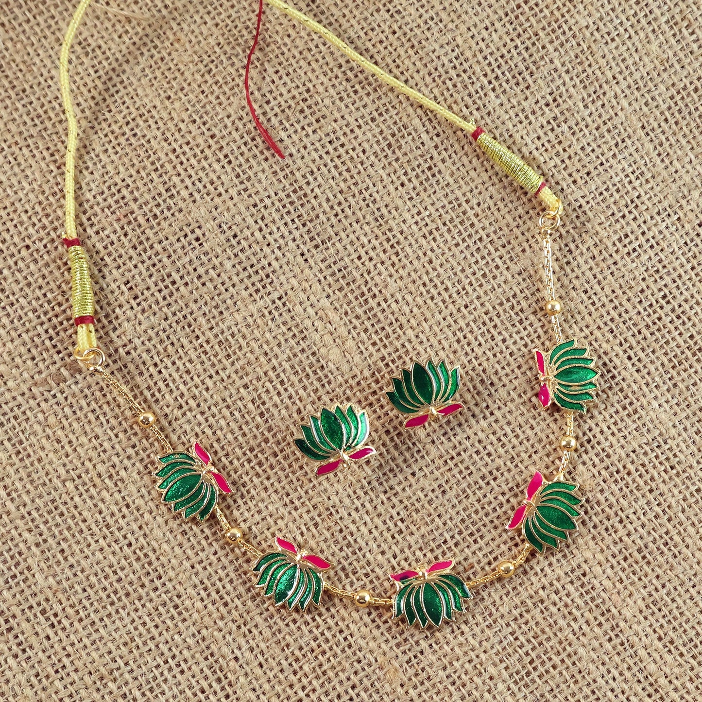Traditional green enamel lotus motif necklace with gold-tone beads