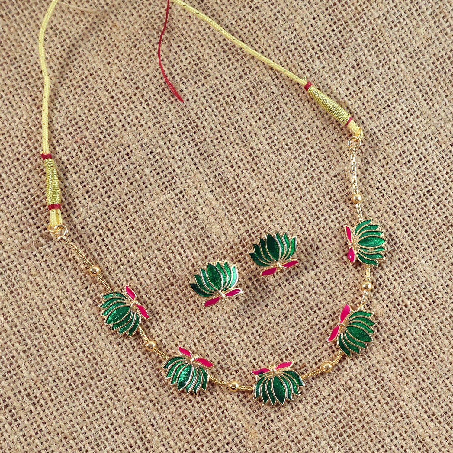 Traditional green enamel lotus motif necklace with gold-tone beads