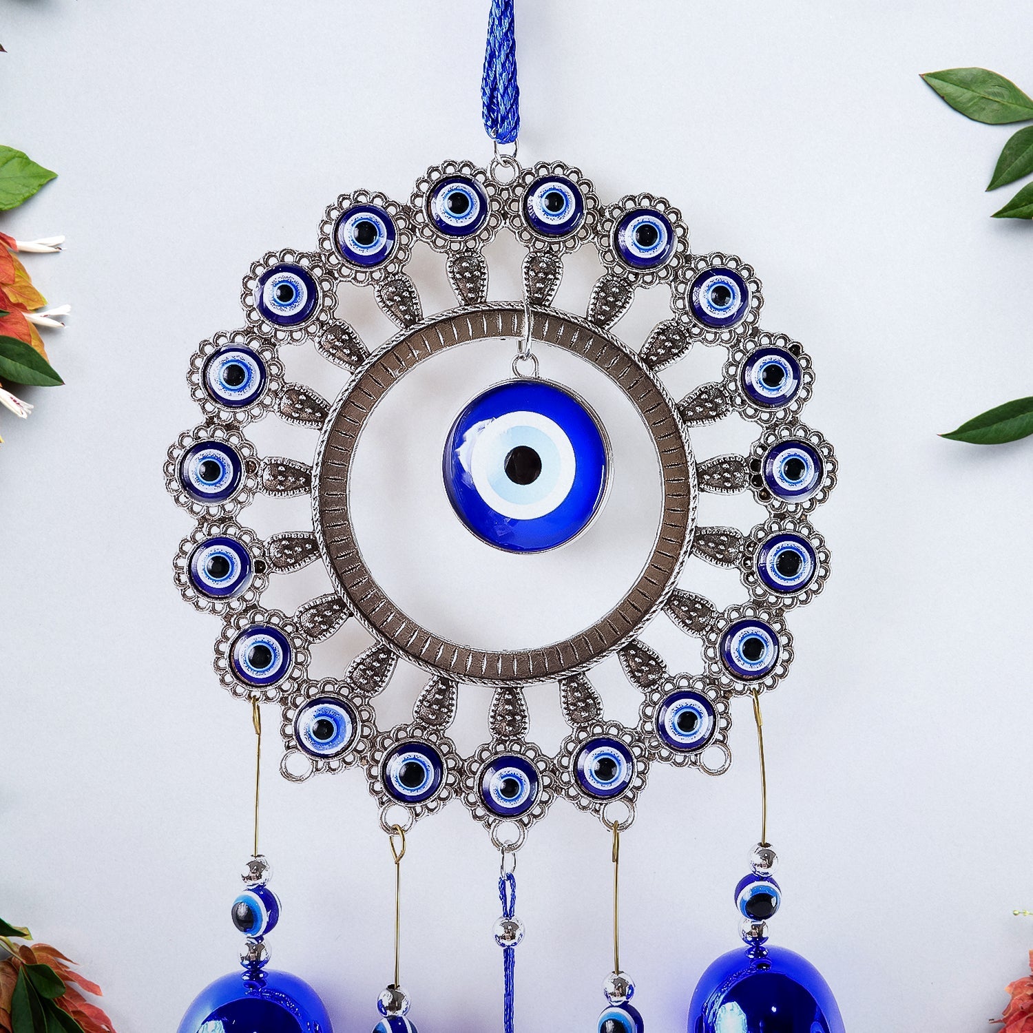 Full view of Om evil eye wind chime with soothing bells