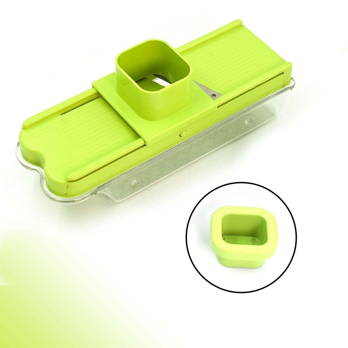 A green plastic slicer with a clear base and a square chute, with a close-up inset of the square chute.