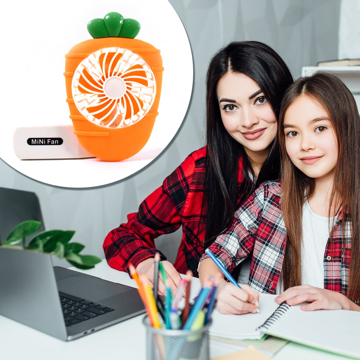 A carrot-shaped mini fan in the top left corner, with a mother and daughter studying at a desk in the main image.